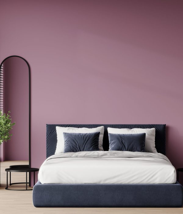 Premium mauve pink lilac and blue bedroom hotel room or home with a big bed. Dark navy bedding. Empty background for art or wallpaper, picture. Painted background wall. Decorative mirrors. 3d render